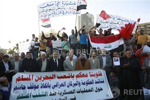 Residents demonstrate in support of the Bahraini people in central Baghdad.