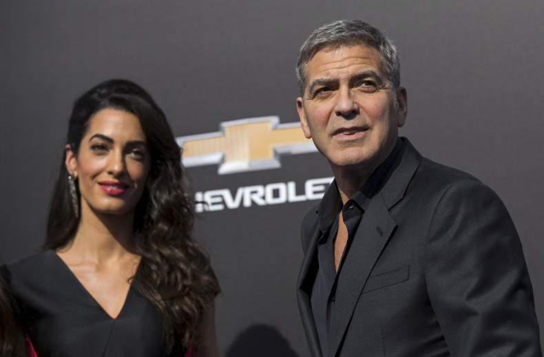 [01:26] Cast member George Clooney and his wife Amal pose at the premiere of "Tomorrowland" at AMC theatres in Downtown Disney in Anaheim