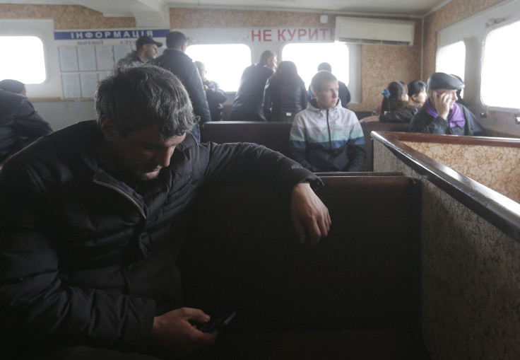 People travel by boat from Russia to Crimea. 