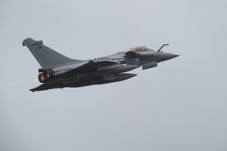 French Dassault Rafale combat aircraft, seen in this photo released by ECPAD, is in flight after taking off from Saint-Dizier military base