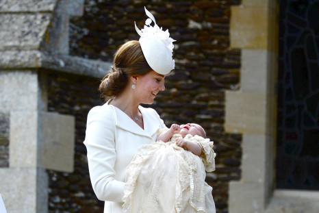 Kate Middleton carries her daughter Princess Charlotte