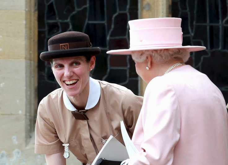 [8:03] Prince George's nanny, Maria Teresa Turrion Borrallo (in her Norland Nanny Uniform) talks to Queen Elizabeth II as they leave the Church of St Mary Magdalene on the Sandringham Estate for the Christening of Princess Charlotte of Cambridge 