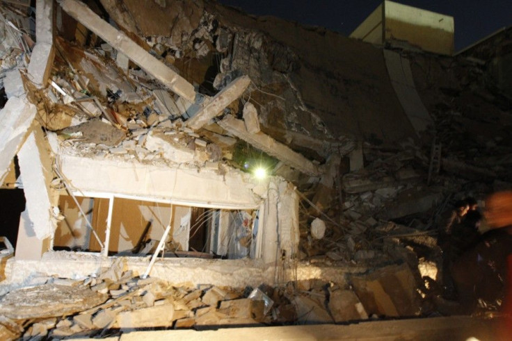 A view of the building, destroyed in what the government said was a western missile attack, inside Bab Al-Aziziyah