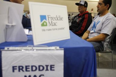 Home owners speak with a Freddie Mac representative in Phoenix
