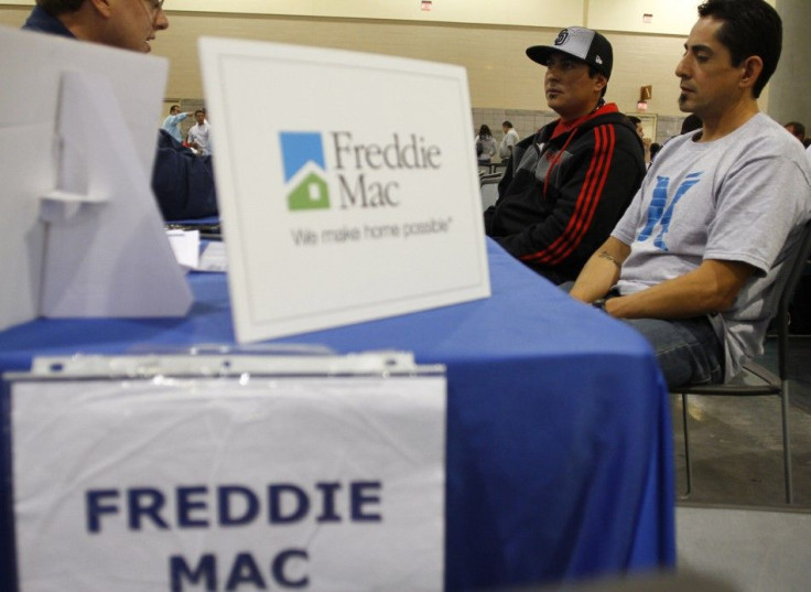 Home owners speak with a Freddie Mac representative in Phoenix