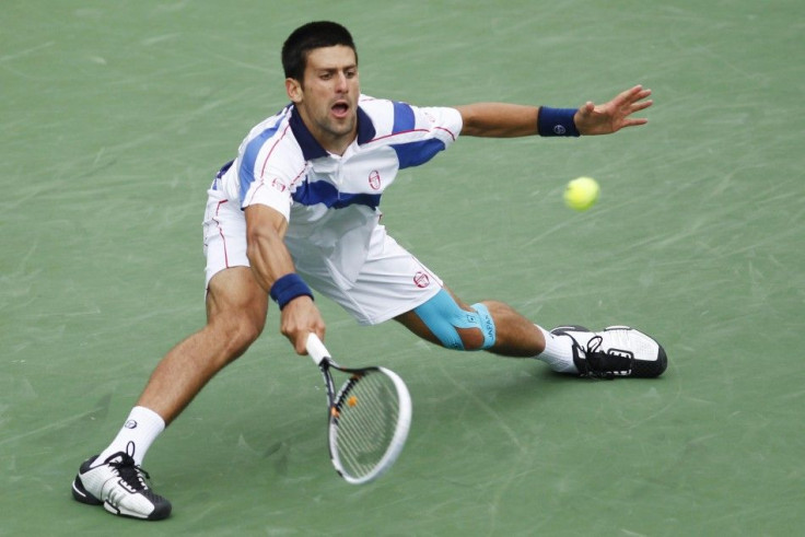 Djokovic of Serbia returns a shot against Nadal of Spain during the men's final of the ATP tennis tournament in Indian Wells.