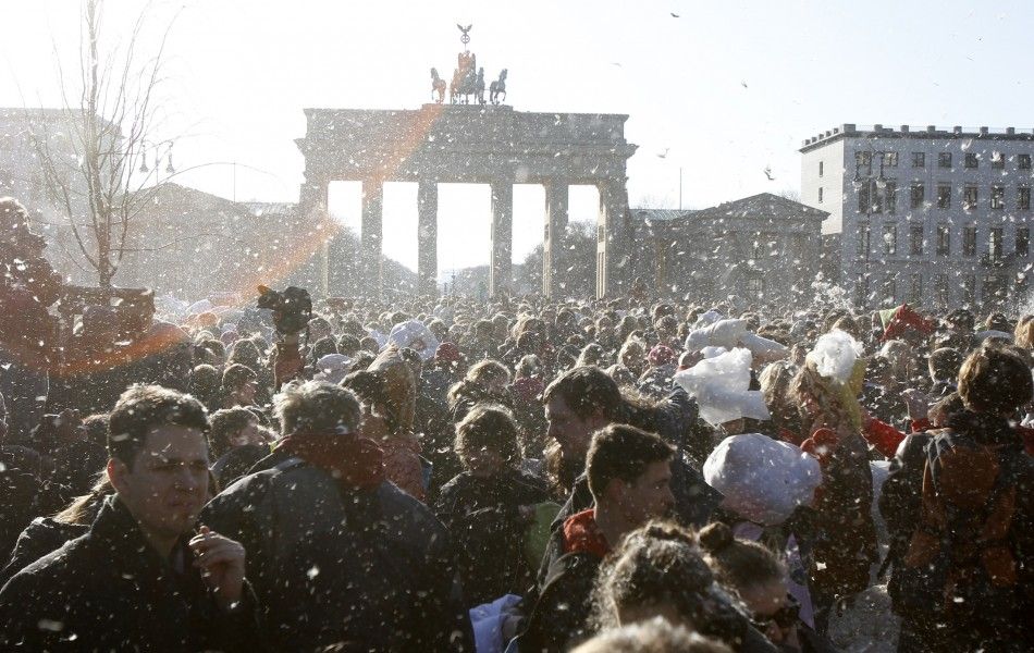 People attend flashmob pillow fight at Brandenburger Tor in Berlin