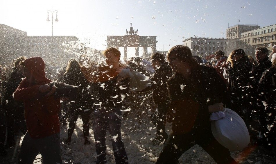 People attend flashmob pillow fight at Brandenburger Tor gate in Berlin