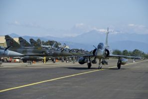 A French Air Force Mirage 2000 jet taxis at the Solenzara military air base before a mission over Libya.