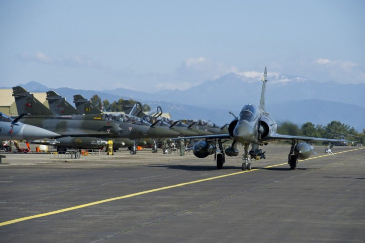 A French Air Force Mirage 2000 jet taxis at the Solenzara military air base before a mission over Libya.