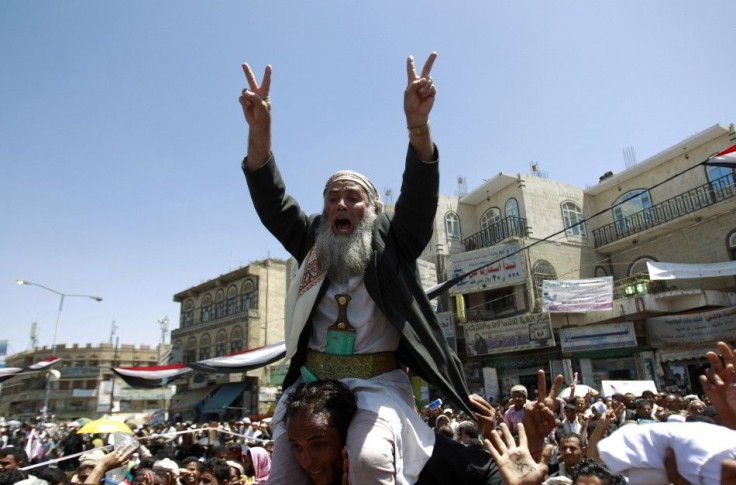 An anti-government protester shouts slogans during a rally demanding the ouster of Yemen's President's Ali Abdullah Saleh in Sanaa March 21, 2011. 