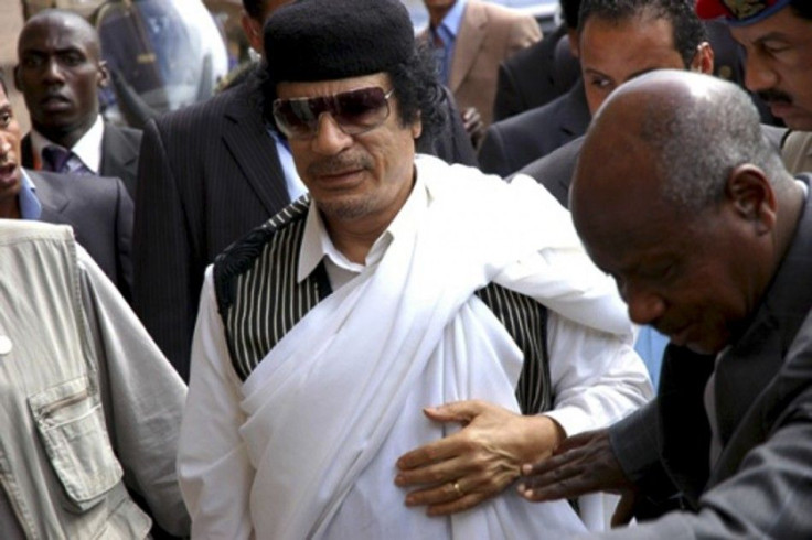 Libya's President Gaddafi arrives for the official opening of the Gaddafi National mosque in Uganda's capital Kampala