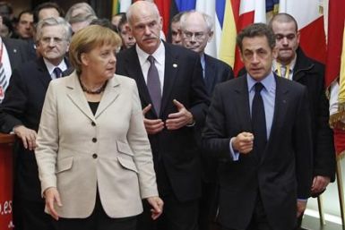 ECB President Trichet, Germany's Angela Merkel, Greece's Prime Minister Papandreou EU Council President Van Rompuy and France's President Sarkozy leave the EU Council building in Brussels - file photo.