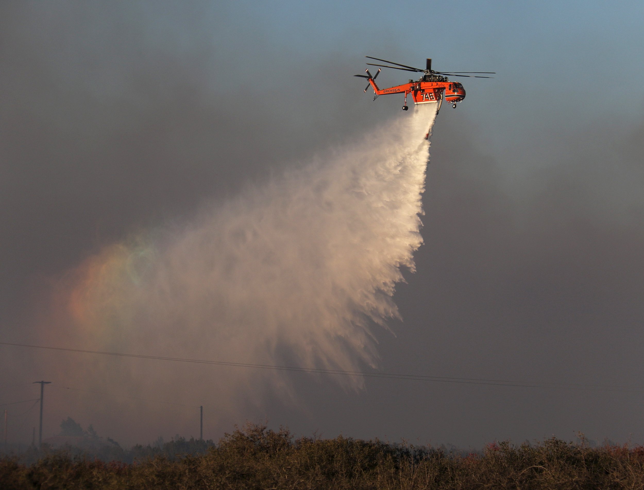 California Storms Bring Record July Rainfall, Flooding, Help Contain 