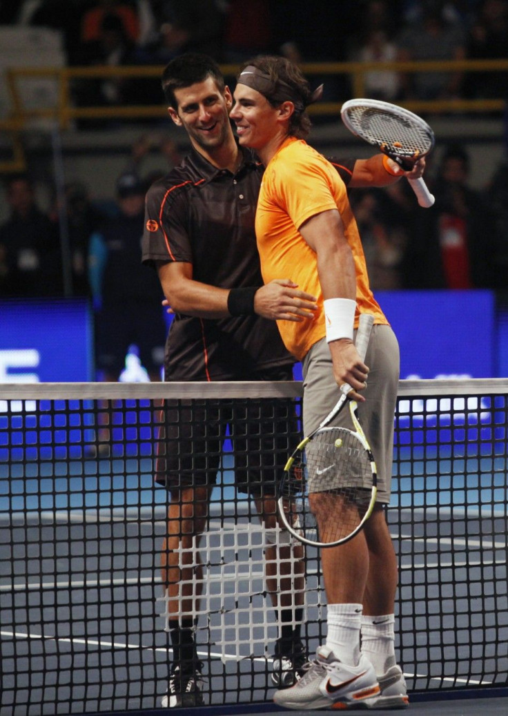 Rafael Nadal of Spain is congratulated by Novak Djokovic of Serbia after their exhibition tennis match in Bogota.