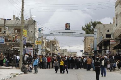 Protesters gather near the Omari Mosque in the southern old city of Deraa