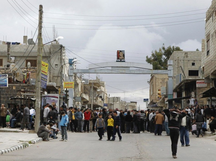 Protesters gather near the Omari Mosque in the southern old city of Deraa