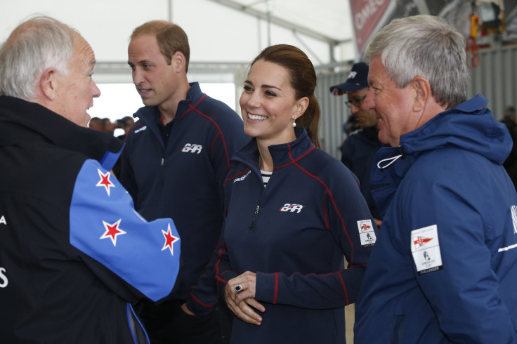 [12:15] Britain's Prince William and his wife Catherine, Duchess of Cambridge, speak with dignitaries as they tour the base of Emirates Team New Zealand