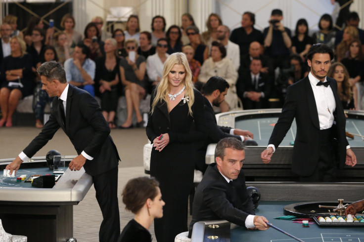 [12:12] Model Lara Stone presents a creation by German designer Karl Lagerfeld as part of his Haute Couture Fall Winter 2015/2016 