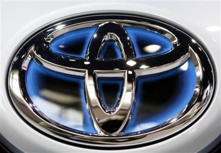 A Toyota logo is seen on the front of a plug-in Prius at the Chicago Auto Show