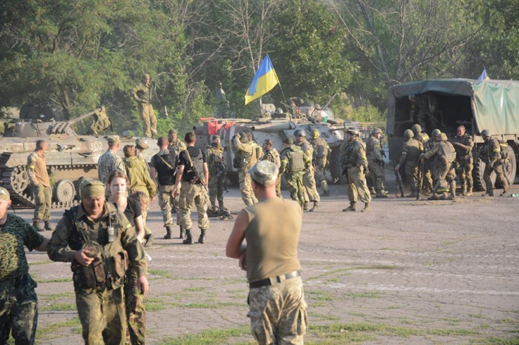 Ukrainian troops regroup after intense fighting