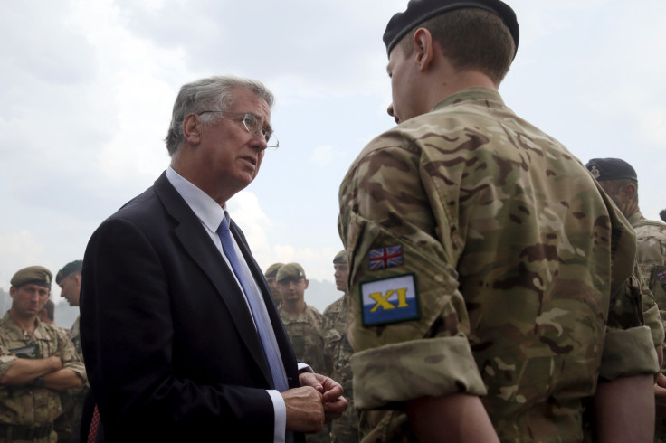 Michael Fallon speaks to military trainers in Ukraine. 