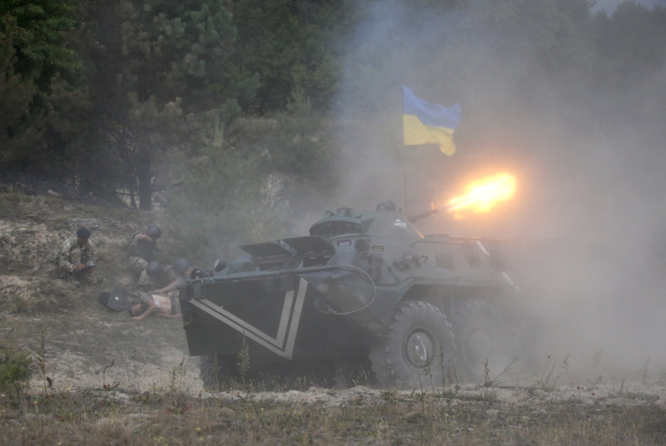 A Ukrainian tank fires during a training drill.