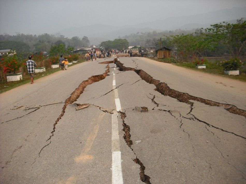 An earthquake damaged road is seen in Tarlay