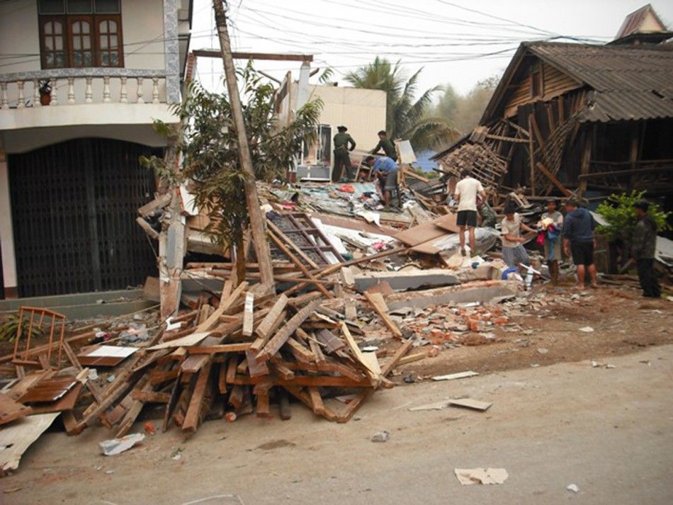 Earthquake damaged buildings are seen in Tarlay