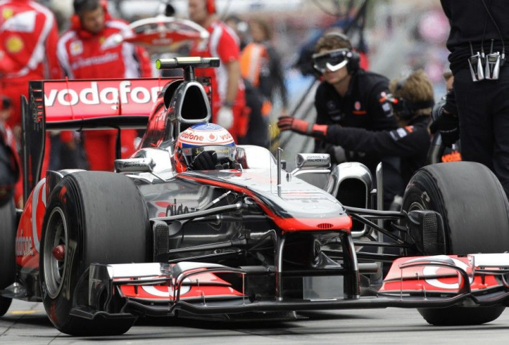 McLaren Formula One driver Button of Britain drives out of the pits during the first practice session of the Australian F1 Grand Prix at the Albert Park circuit in Melbourne.