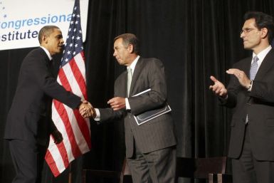 U.S. President Barack Obama (L) shakes hands with House Minority Leader John Boehner as House Minority Whip Eric Cantor (R)