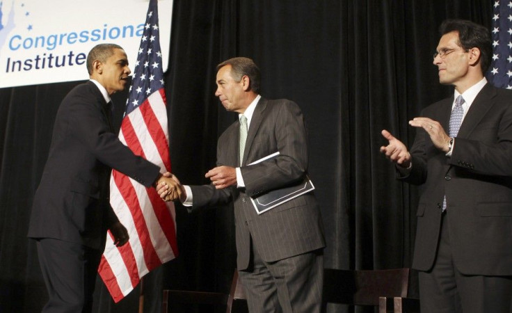 U.S. President Barack Obama (L) shakes hands with House Minority Leader John Boehner as House Minority Whip Eric Cantor (R)