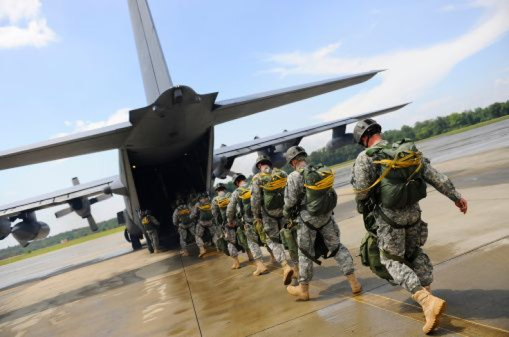 U.S. Army Rangers boarding a MC-130 aircraft