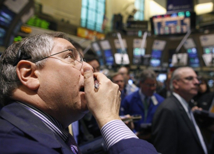 Traders work on the floor of the New York Stock Exchange 