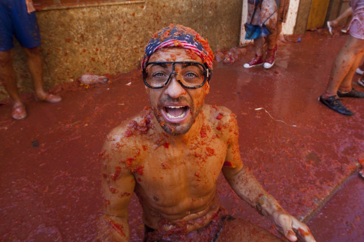 A man in glasses at La Tomatina