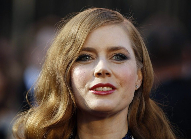 Amy Adams, best supporting actress nominee for her role in The Fighter, arrives at the 83rd Academy Awards in Hollywood