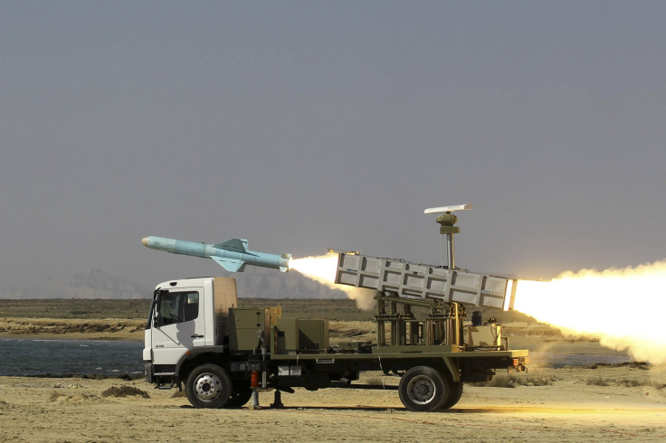 Iranina military launches a missile from a truck
