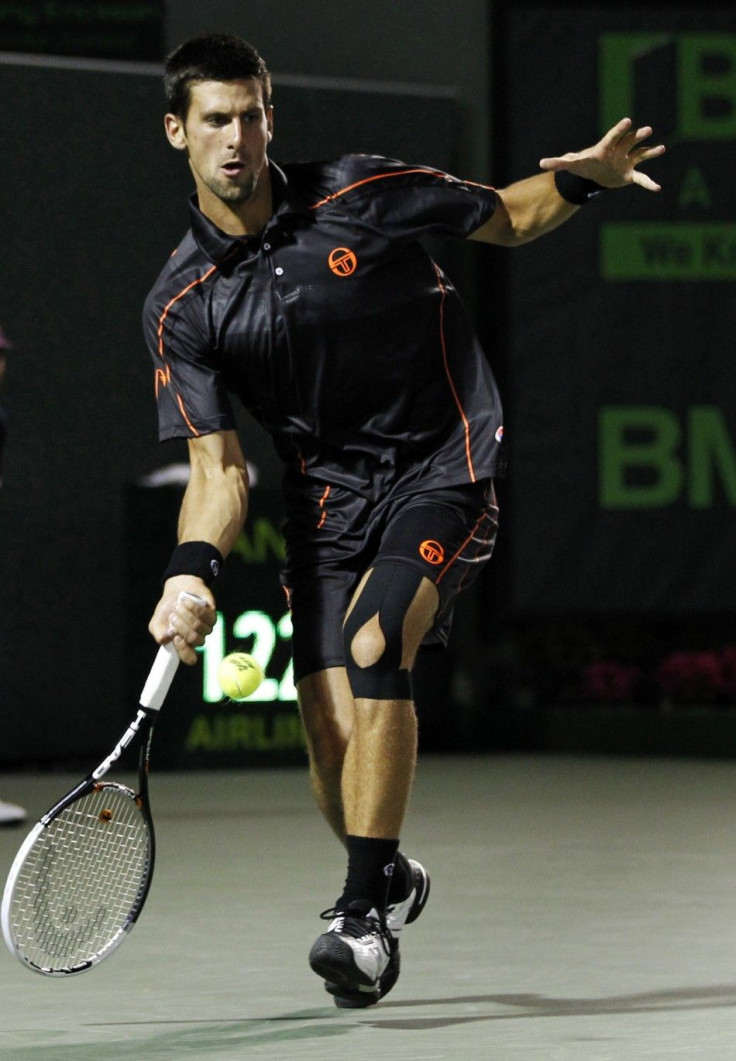 Novak Djokovic of Serbia hits a return during his match against James Blake of the U.S. at the Sony Ericsson Open tennis tournament in Key Biscayne.