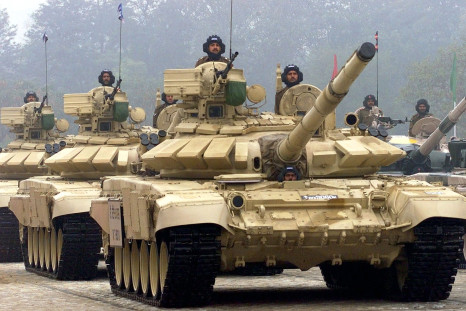 Indian soldiers driving the T-90MS tank