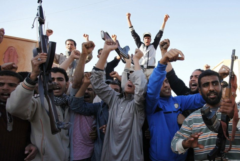 Libyans loyal to Libya's leader Muammar Gaddafi chant slogans in the town of Mizdah