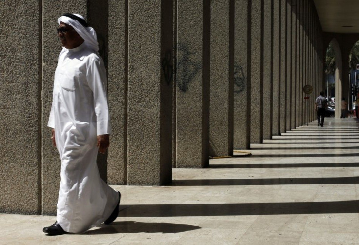 A man walks near the Bahrain Financial Harbour in Manama