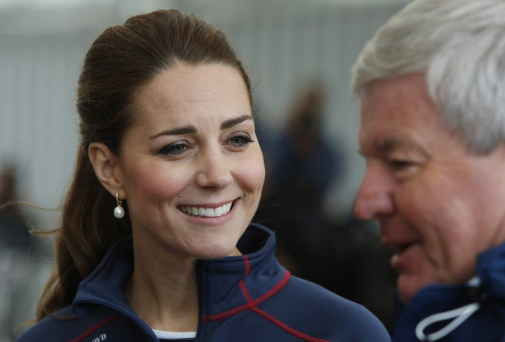 [08:46] Britain's Catherine, Duchess of Cambridge, smiles as she tours the base of Emirates Team New Zealand