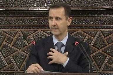 Video grab of Syrian President Bashar Al-Assad addressing the parliament in Damascus