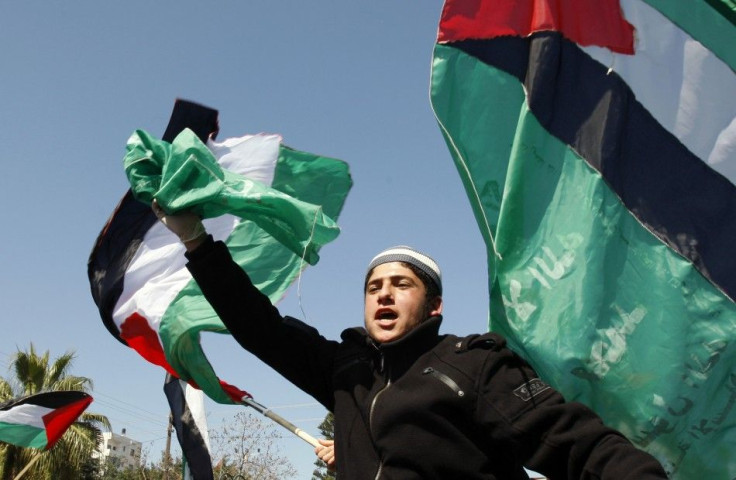 Palestinian shout slogans during a rally in Gaza City