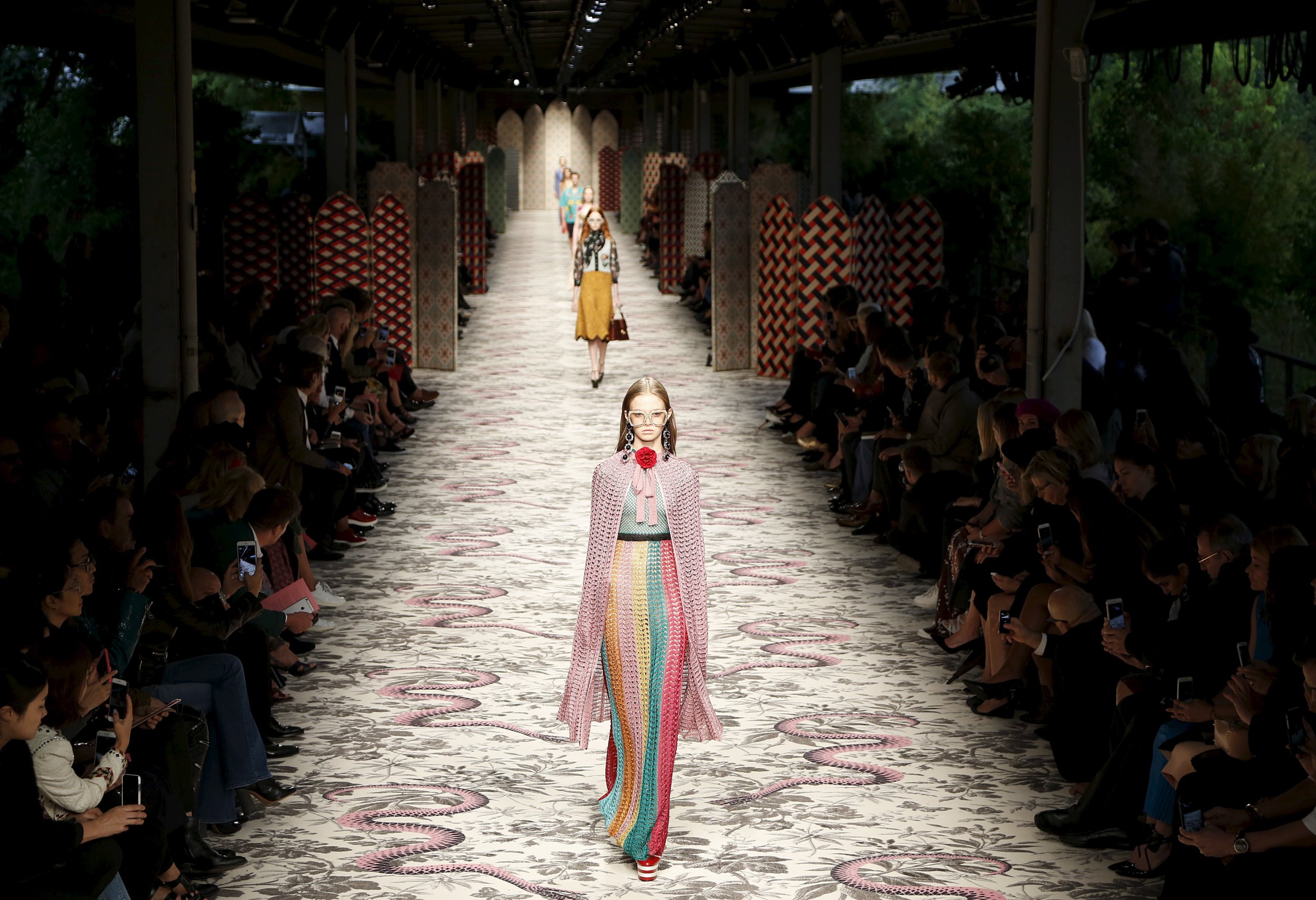 1313 A model presents a creation from the Guccis SpringSummer 2016 collection
