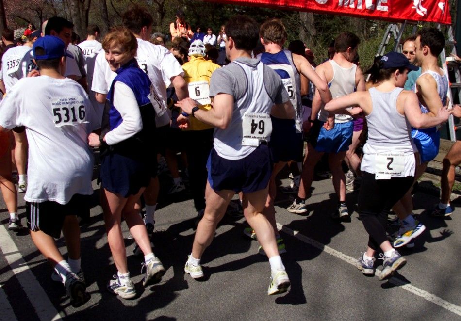 APRIL FOOLS RUNNERS START BACKWARDS MILE RACE IN NEW YORKS CENTRAL PARK.