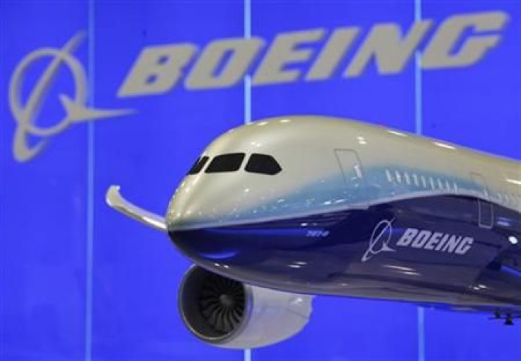 A model of Boeing 787-8 passenger plane is displayed inside its booth at the Asian Aerospace Show in Hong Kong