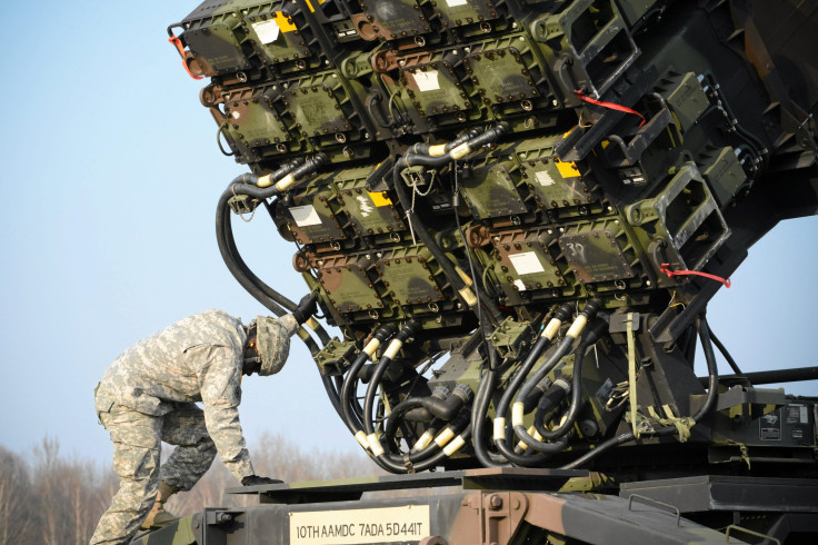 A U.S. soldier inspects a patriot missile system 