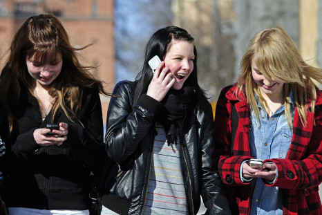 Teenage girls on cell phones 