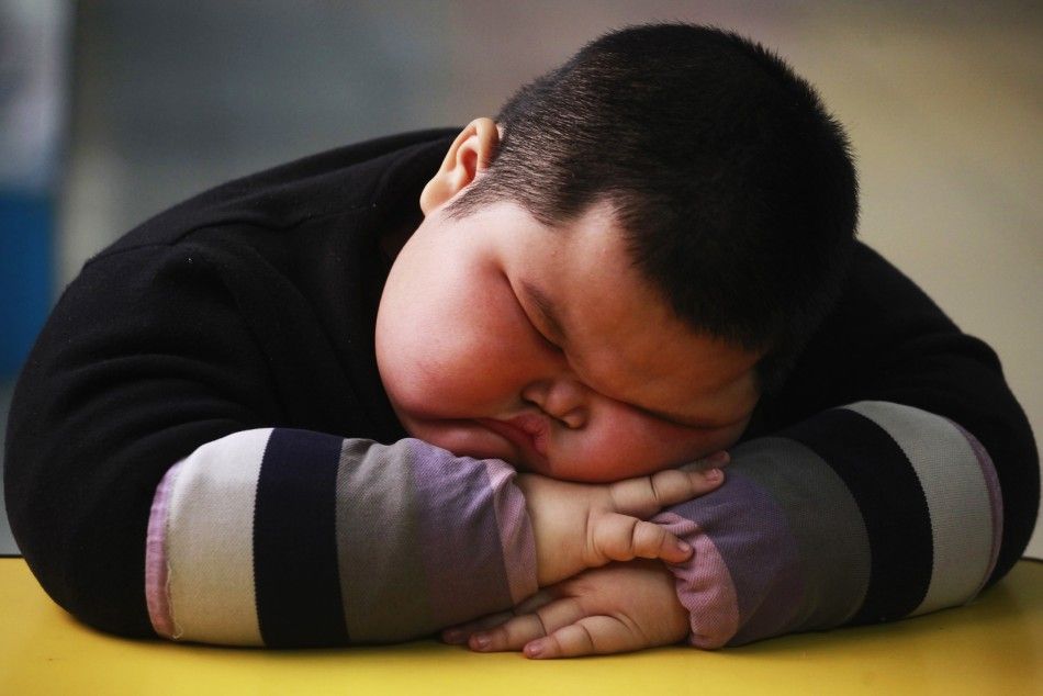 Lu Zhihao takes a nap at a kindergarten in Foshan